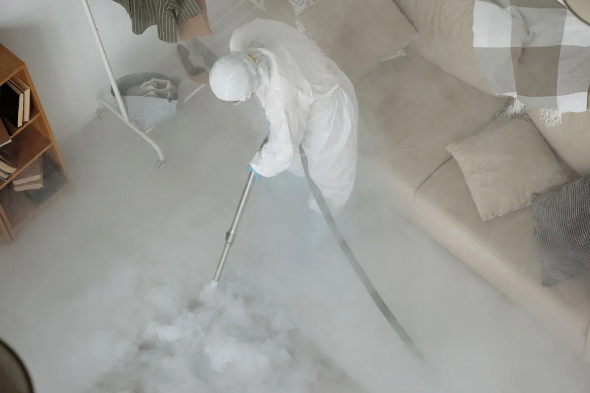 Biohazard cleanup technician in protective equipment, Stratford, NJ